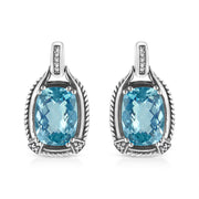 Bids.com .925 Sterling Silver 14x10MM Cushion Cut Blue Topaz Gemstone and Diamond Accent Dangle Earring (I-J Color, I1-I2 Clarity) Earrings