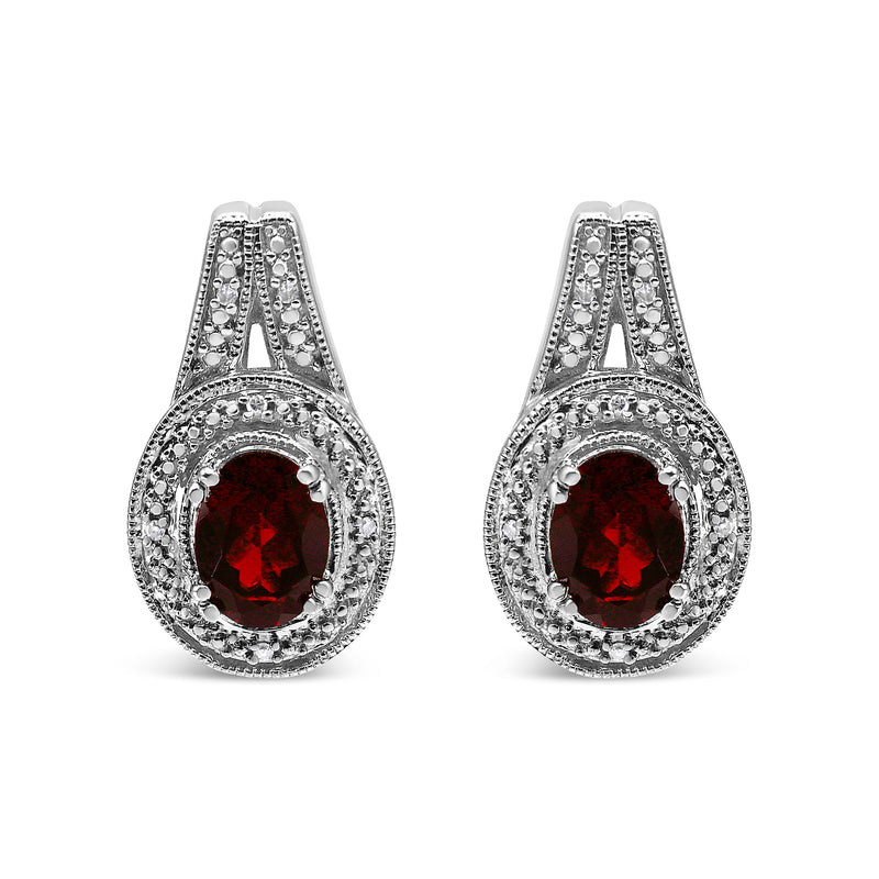 Bids.com .925 Sterling Silver Diamond Accent and 8x6mm Red Oval Garnet Stud Earrings (I-J Color, I1-I2 Clarity) Earrings