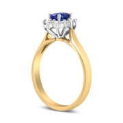Bids.com 14K Yellow Gold 1/5 Cttw Round Diamond and 6x4mm Oval Blue Tanzanite Halo Ring (H-I Color, I1-I2 Clarity) - Size 7.75 Rings
