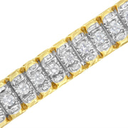 Bids.com 14K Yellow and White Gold 5.0 Cttw Round & Baguette Cut Diamond 7" Reflective Tennis Bracelet (H-I Color, I1-I2 Clarity) Bracelets