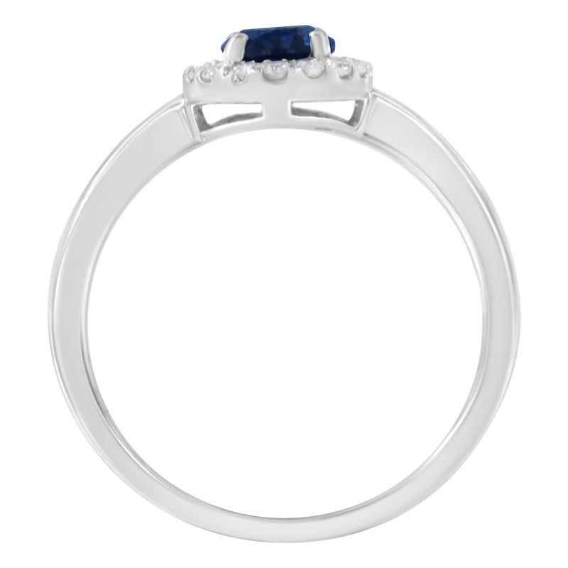 Bids.com 10K White Gold 1/5 Cttw Round Diamond and Prong Set 7MM Created Blue Sapphire Halo Cocktail Ring (H-I Color, I1-I2 Clarity) - Size 7 Rings