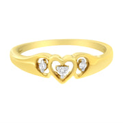 Bids.com 10KT Yellow Gold 1/20 cttw Diamond Triple Heart Diamond Ring (K-L, I1-I2) - Size 7 Rings