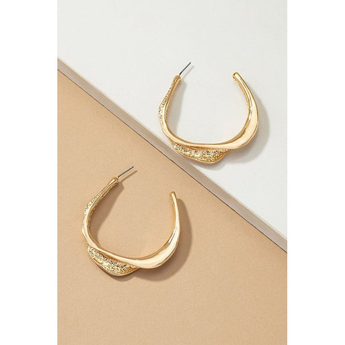 Twisted metal hoop earrings