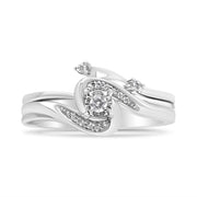 Bids.com .925 Sterling Silver 1/10 Cttw Diamond Swirl and Bypass Bridal Set Ring and Band (I-J Color, I3 Clarity) - Size 7 Rings