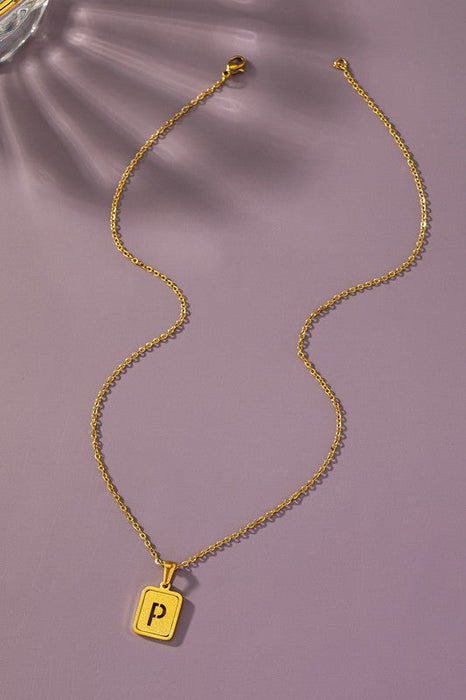 Brass diamond dust cut out initial necklace