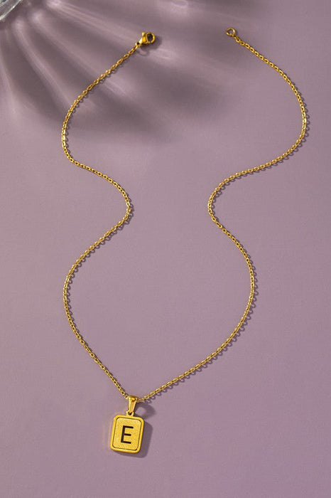 Brass diamond dust cut out initial necklace