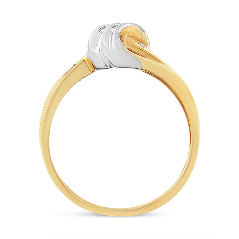 Bids.com 10K Yellow and White Gold 1.00 Cttw Round And Baguette-Cut Diamond Accent Bypass Ring (H-I Color, I2-I3 Clarity) - Ring Size 7 Rings