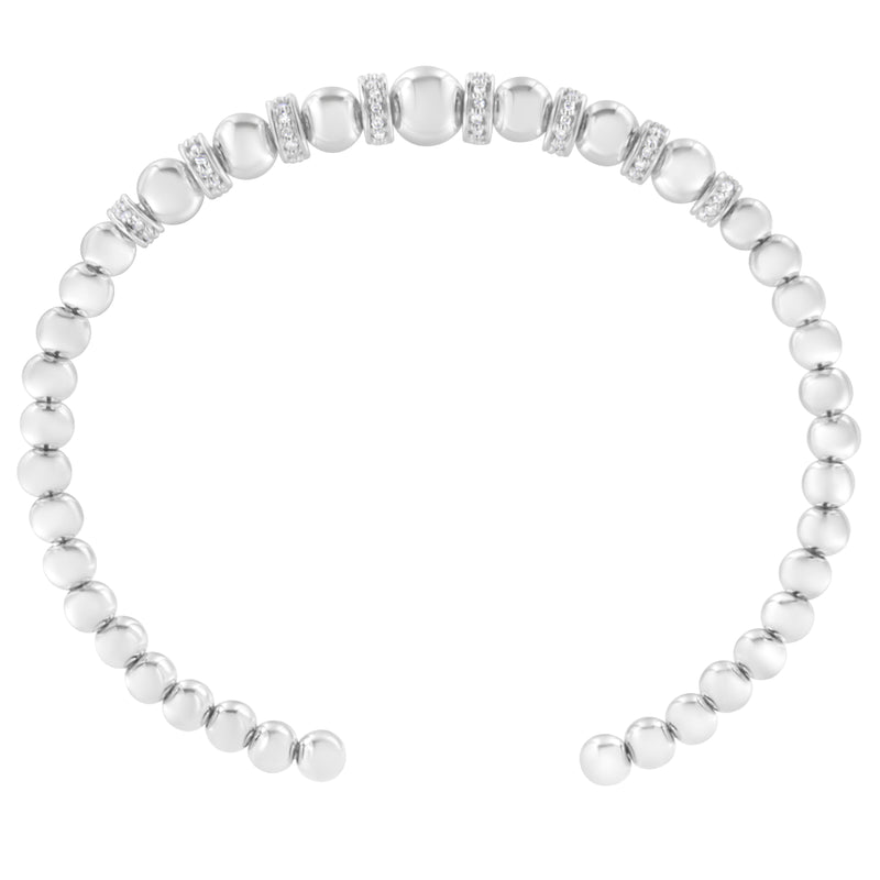 Bids.com .925 Sterling Silver 1/4 Cttw Diamond Rondelle Graduated Ball Bead Cuff Bangle Bracelet (I-J color, I2-I3 clarity) - Fits wrists up to 7 1/2 inches Bracelets