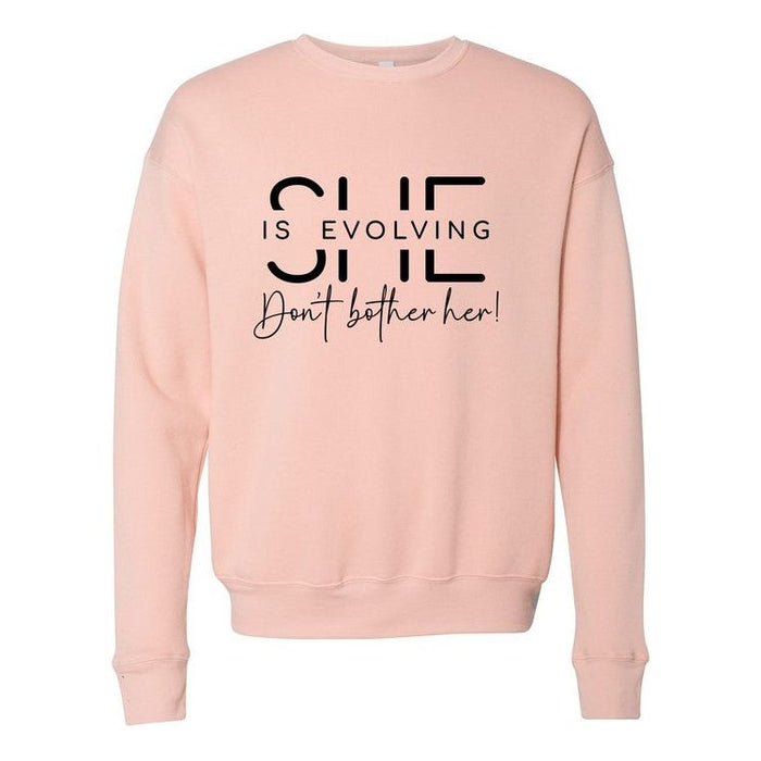 She is Evolving Bella Premium Sweatshirt