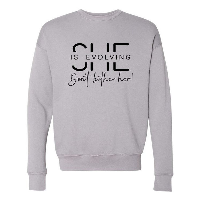 She is Evolving Bella Premium Sweatshirt