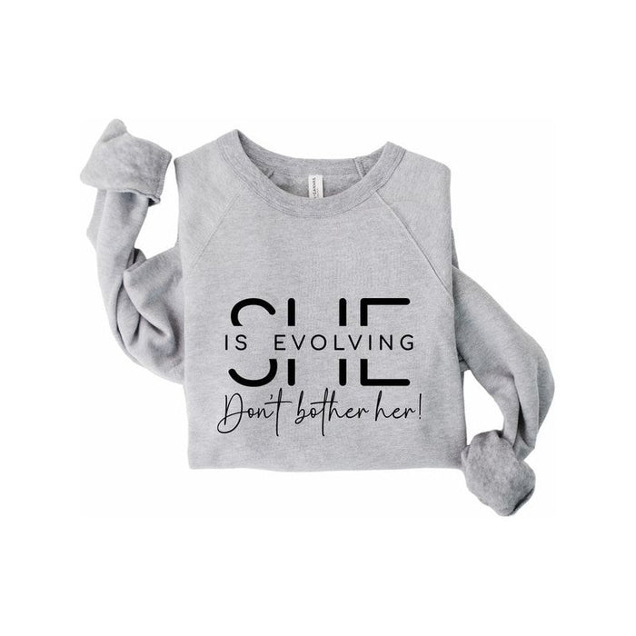 She is Evolving Bella Premium Sweatshirt