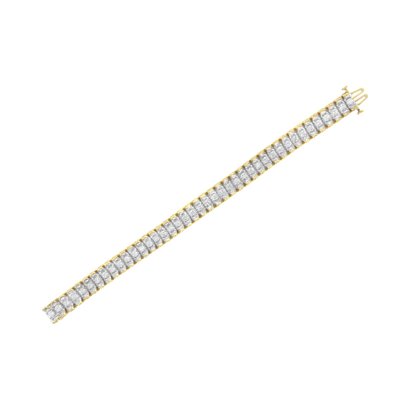 Bids.com 14K Yellow and White Gold 5.0 Cttw Round & Baguette Cut Diamond 7" Reflective Tennis Bracelet (H-I Color, I1-I2 Clarity) Bracelets