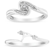 Bids.com .925 Sterling Silver 1/10 Cttw Diamond Swirl and Bypass Bridal Set Ring and Band (I-J Color, I3 Clarity) - Size 7 Rings