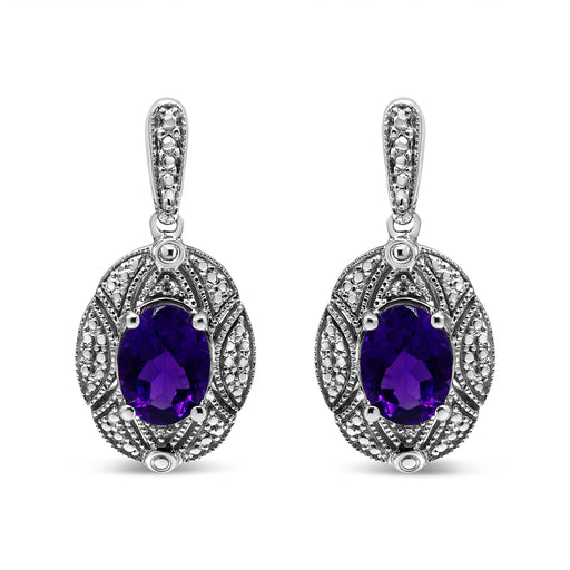 Bids.com .925 Sterling Silver Diamond Accent and 8x6mm Purple Oval Amethyst Stud Earrings (I-J Color, I1-I2 Clarity) Earrings