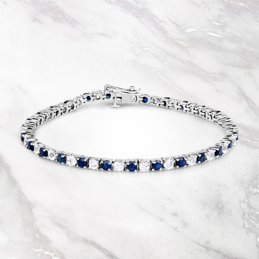 Bids.com 6.87 ct. t.w. Blue Sapphire and White Topaz Bracelet in Sterling Silver Bracelets