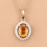 Bids.com 1.78 Carat Genuine Yellow Sapphire and White Diamond 14K Yellow Gold Pendant Pendants