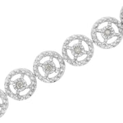 Bids.com .925 Sterling Silver 1/2 Cttw Diamond Nested Circle Miracle Set Open Wheel 7" Fashion Link Bracelet (I-J Color, I3 Clarity) Bracelets