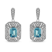 Bids.com .925 Sterling Silver 7x5MM Emerald Shape Blue Topaz and Diamond Accent Art Deco Halo Style Drop and Dangle Earrings (I-J Color, I1-I2 Clarity) Earrings