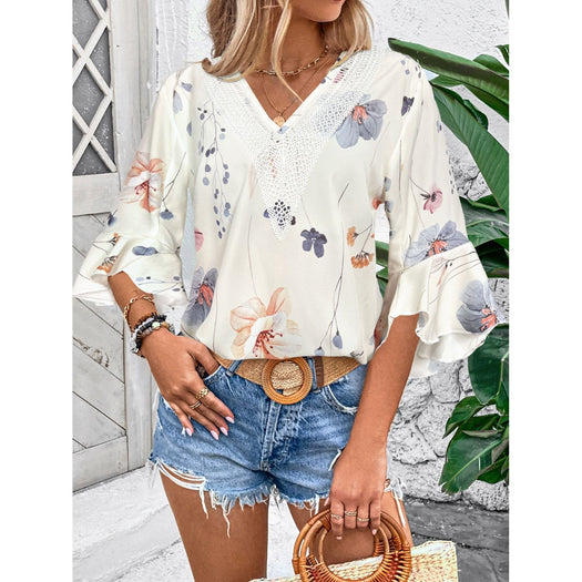 Ruffled Printed V-Neck Half Sleeve Blouse