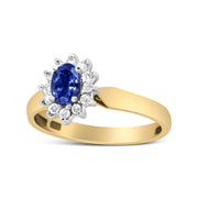 Bids.com 14K Yellow Gold 1/5 Cttw Round Diamond and 6x4mm Oval Blue Tanzanite Halo Ring (H-I Color, I1-I2 Clarity) - Size 7.75 Rings