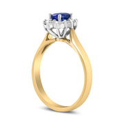 Bids.com 14K Yellow Gold 1/5 Cttw Round Diamond and 6x4mm Oval Blue Tanzanite Halo Ring (H-I Color, I1-I2 Clarity) - Size 7.75 Rings