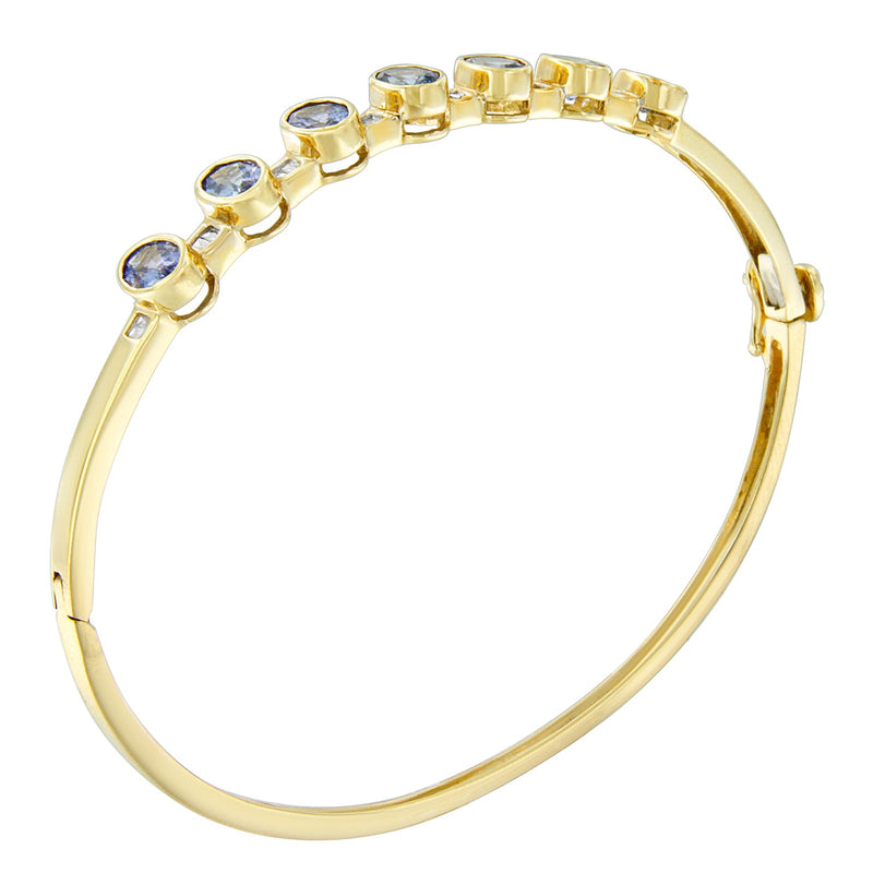 Bids.com 14K Yellow Gold Alternating Bezel Set 5MM Oval Shaped Tanzanite and 1/5 Cttw Diamond Bangle Bracelet (H-I Color, VS2-SI1 Clarity) - Fit's wrists up to 7.25" Inches Bracelets