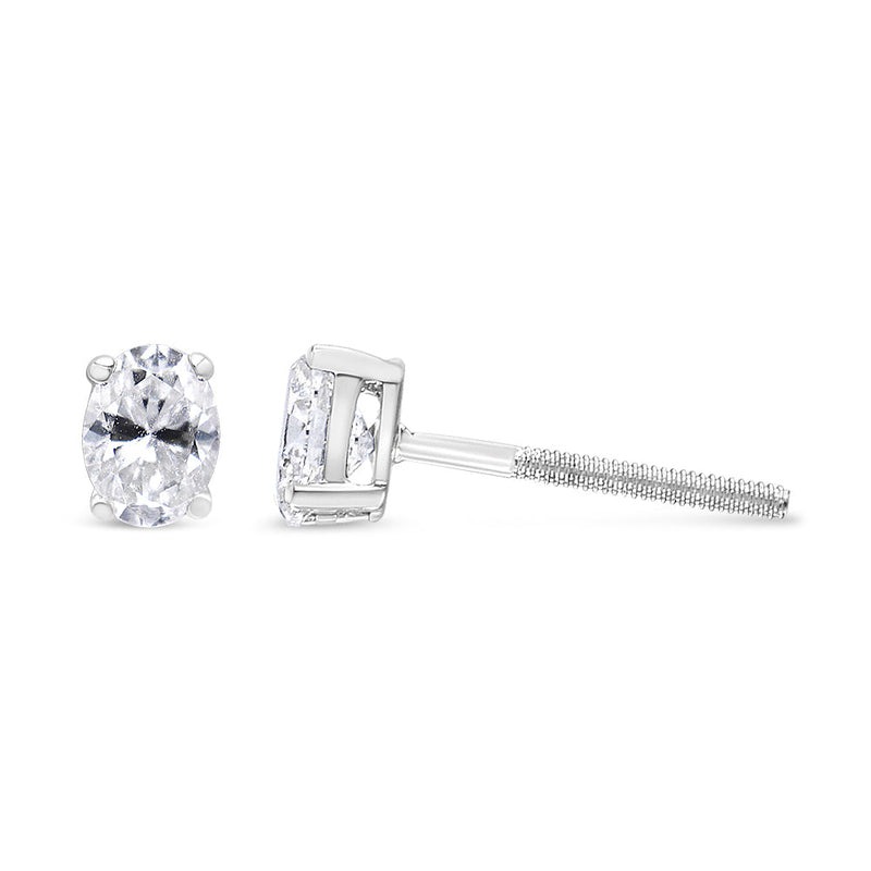 Bids.com 14K White Gold 1.00 Cttw Lab Grown Oval Solitaire Diamond Stud Earrings (F-G Color, VS2-SI1 Clarity) Earrings