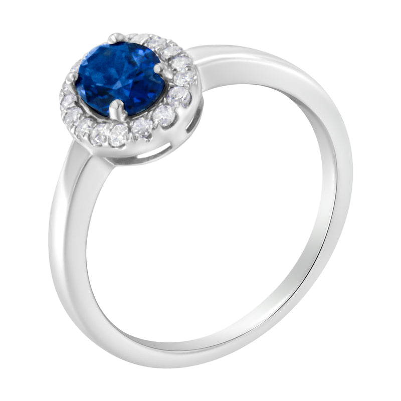 Bids.com 10K White Gold 1/5 Cttw Round Diamond and Prong Set 7MM Created Blue Sapphire Halo Cocktail Ring (H-I Color, I1-I2 Clarity) - Size 7 Rings