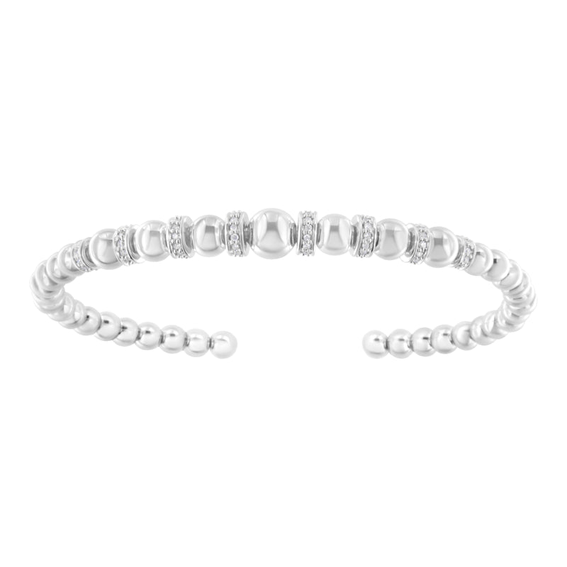 Bids.com .925 Sterling Silver 1/4 Cttw Diamond Rondelle Graduated Ball Bead Cuff Bangle Bracelet (I-J color, I2-I3 clarity) - Fits wrists up to 7 1/2 inches Bracelets