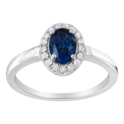 Bids.com 10K White Gold 1/5 Cttw Round Diamond and Prong Set 7MM Created Blue Sapphire Halo Cocktail Ring (H-I Color, I1-I2 Clarity) - Size 7 Rings
