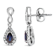 Bids.com 10K White Gold Pear Cut Blue Sapphire and 1/7 Cttw Diamond Infinity Drop and Dangle Earrings (I-J Color, I1-I2 Clarity) Earrings