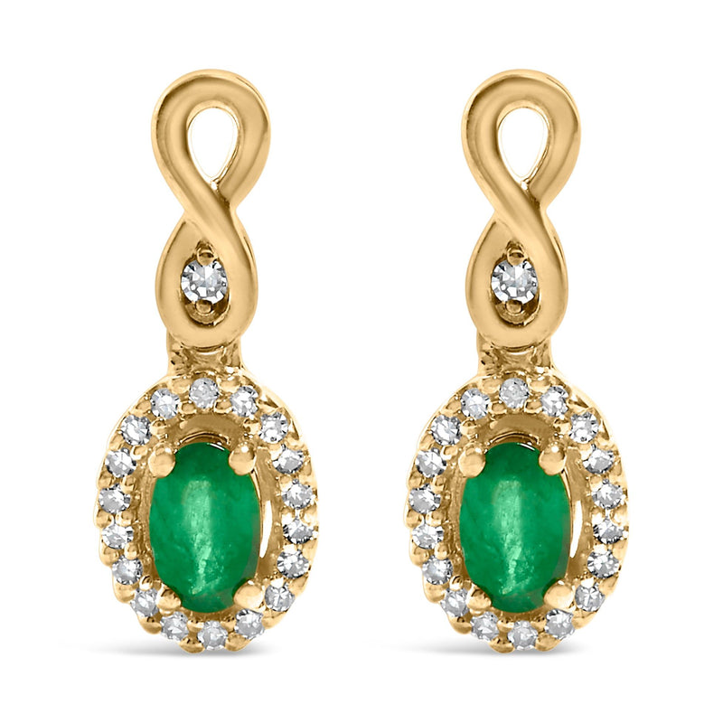 Bids.com 10K Yellow Gold Oval Cut Green Emerald 5x3 mm and 1/7 Cttw Round Diamond Dangle Earrings Earrings