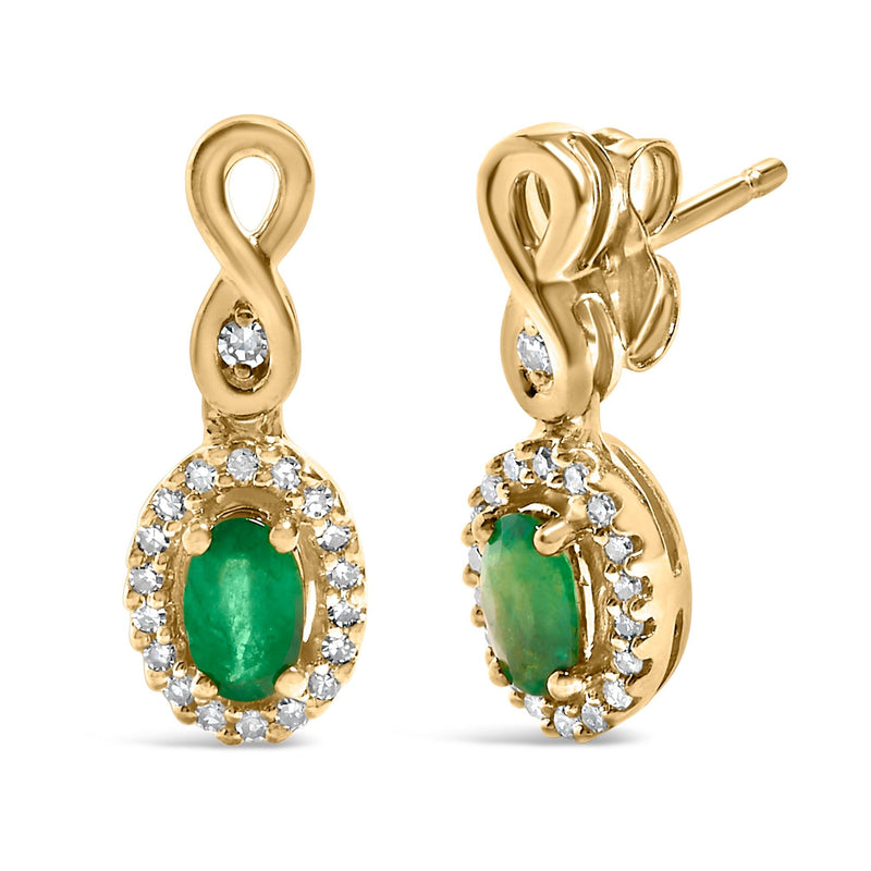 Bids.com 10K Yellow Gold Oval Cut Green Emerald 5x3 mm and 1/7 Cttw Round Diamond Dangle Earrings Earrings