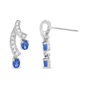 Bids.com 14K White Gold 4x3MM Oval Shaped Natural Blue Tanzanite Gemstone and 1/5 Cttw Diamond Double 3/4" Inch Drop Stud Earrings (H-I Color, VS1-VS2 Clarity) Earrings