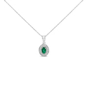 Bids.com 14K White Gold Oval 6x4 MM Green Emerald and Diamond Halo Pendant Necklace - 18 inch Necklaces