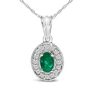 Bids.com 14K White Gold Oval 6x4 MM Green Emerald and Diamond Halo Pendant Necklace - 18 inch Necklaces