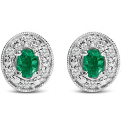 Bids.com 14K White Gold Oval Green Emerald and 1/10 Cttw Diamond Halo Stud Earrings  (I-J Color, I1-I2 Clarity) Earrings