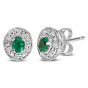 Bids.com 14K White Gold Oval Green Emerald and 1/10 Cttw Diamond Halo Stud Earrings  (I-J Color, I1-I2 Clarity) Earrings