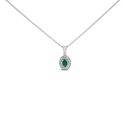 Bids.com 14K White Gold Oval Green Emerald and Diamond Halo Pendant Necklace - 18" Inches Necklaces
