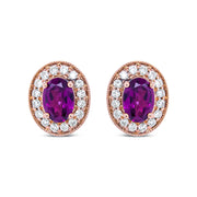 Bids.com 14K Rose Gold 7x5mm Oval Cut Garnet and 3/8 Cttw Round Diamond Halo Stud Earrings (G-H Color, SI1-SI2 Clarity) Earrings
