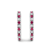 Bids.com 10K White Gold Alternating Diamond and Red Ruby Huggy Hoop Earrings (I-J Color, I1-I2 Clarity) Earrings