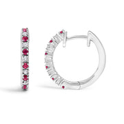 Bids.com 10K White Gold Alternating Diamond and Red Ruby Huggy Hoop Earrings (I-J Color, I1-I2 Clarity) Earrings