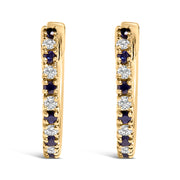 Bids.com 10K Yellow Gold Alternating Blue Sapphire 1/10 Cttw Diamond Huggy Hoop Earrings  (I-J Color, I1-I2 Clarity) Earrings
