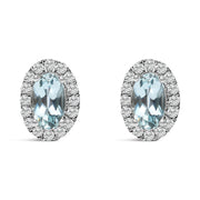 Bids.com 10K White Gold 5x3 MM Oval Purple Amethyst and Diamond Halo Stud Earrings (I-J Color, I1-I2 Clarity) Earrings