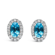 Bids.com 10K White Gold 5x3 MM Oval Purple Amethyst and Diamond Halo Stud Earrings (I-J Color, I1-I2 Clarity) Earrings