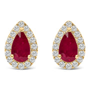 Bids.com 10K Yellow Gold 5X3 MM Pear-Cut Ruby and 1/7 Cttw Diamond Halo Stud Earrings (I-J Color, I1-I2 Clarity) Earrings