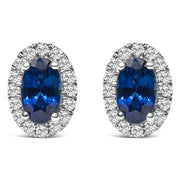 Bids.com 10K White Gold 5x3 MM Oval Purple Amethyst and Diamond Halo Stud Earrings (I-J Color, I1-I2 Clarity) Earrings