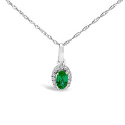 Bids.com 10K White Gold 5x3mm Green Emerald and Diamond Accent Halo Oval Shape 18" Pendant Necklace (I-J Color, I1-I2 Clarity) Necklaces