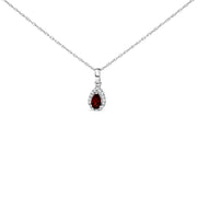 Bids.com 10K White Gold 5x3mm Green Emerald and Diamond Accent Halo Pear Shape 18" Pendant Necklace (I-J Color, I1-I2 Clarity) Necklaces