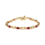 Bids.com 10K Yellow Gold Oval Ruby and 1/10 Cttw Diamond Bar Prong Set Bracelet (H-I Color, SI1-SI2 Clarity)  - Size 7" Bracelets